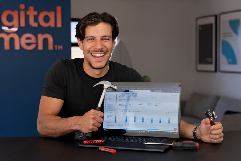 Miguel Diamond with a range of SEO tools holding a hammer